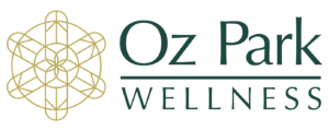 A green banner with the words oz farm well being written in it.